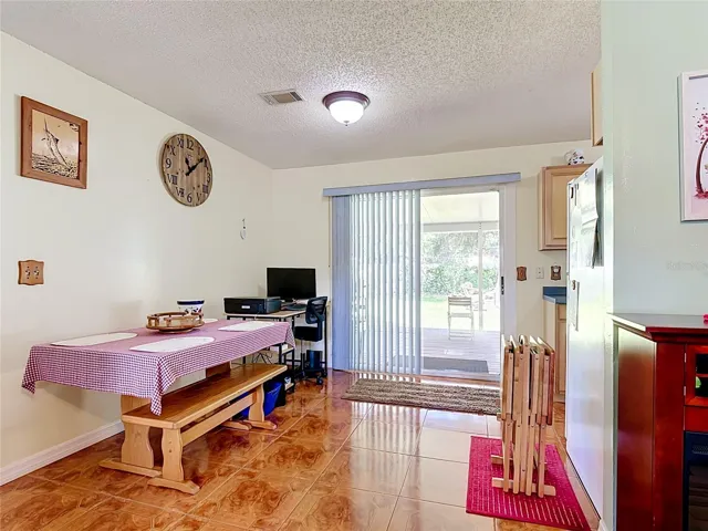 Dining Room with Glass Sliding Doors to back porch