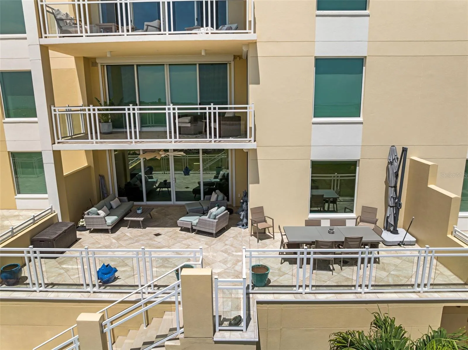 Private balcony and stairs to beach and amenities