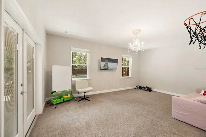 4th large bedroom or playroom with access to pool