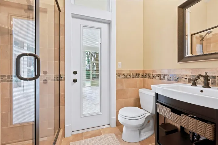 Bath leading to patio and spa