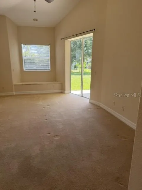 Primary Bedroom with Slider and Window Seat with Storage