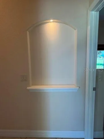 Lighted Niche in Guest Hallway Storage Closet is at Opposite End of the Hallway