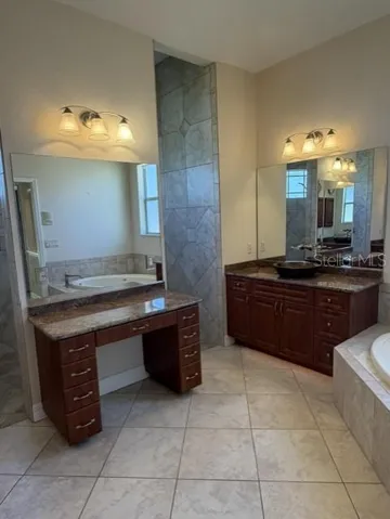 Primary Bath Make up Vanity and One of Two Vanities