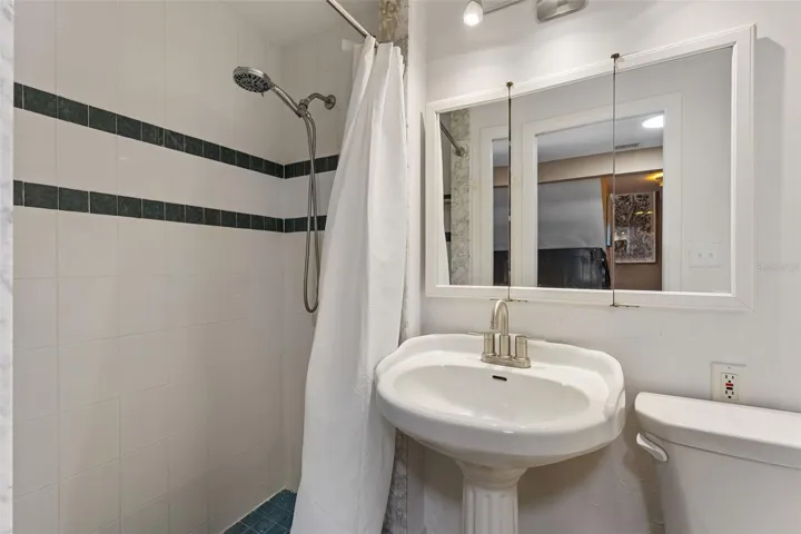 Bath near laundry and bedroom 2