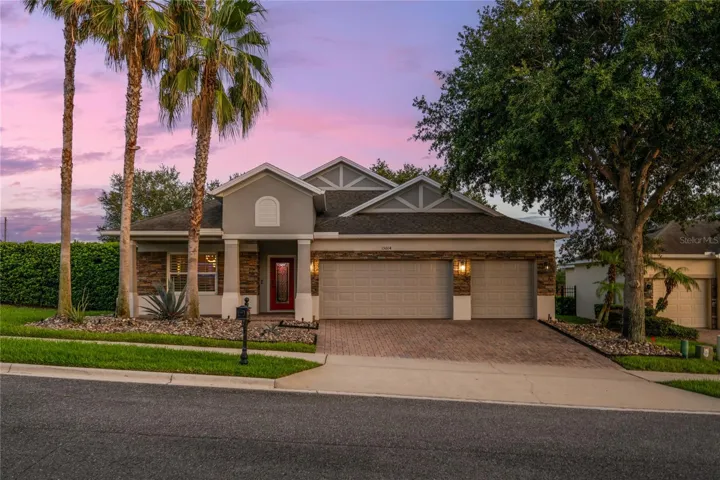 Great curb appeal, 3 car garage and paver driveway.