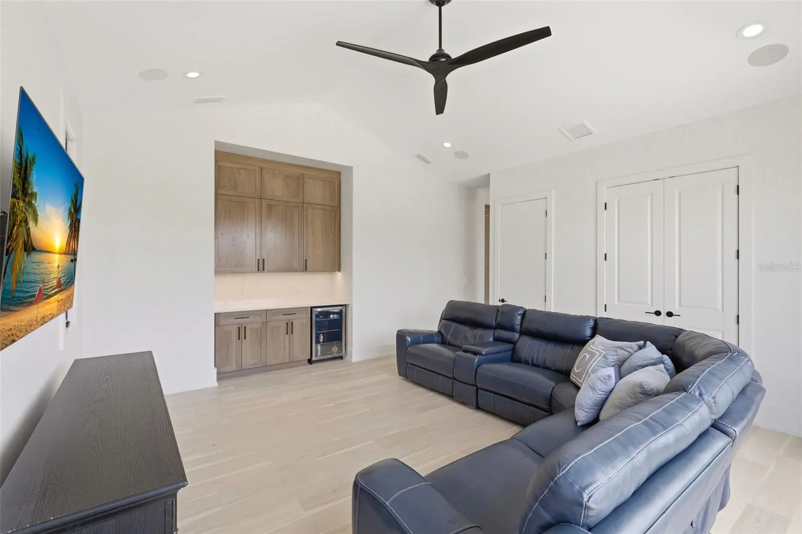Bonus room with beverage refrigerator