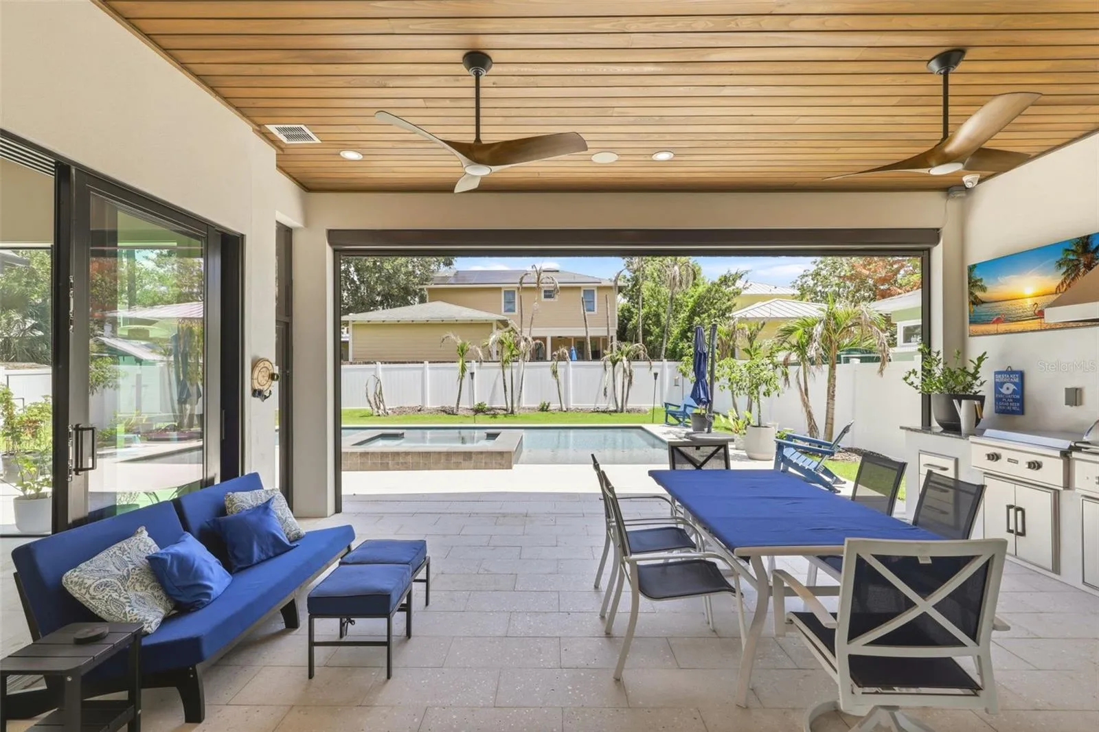Oversized lanai area with cypress tongue and groove ceilings &amp; retractable screens