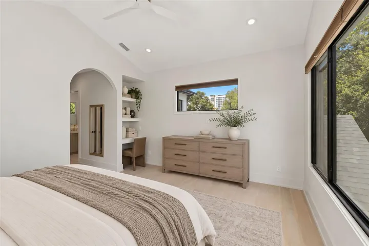 Primary bedroom with vanity/desk area