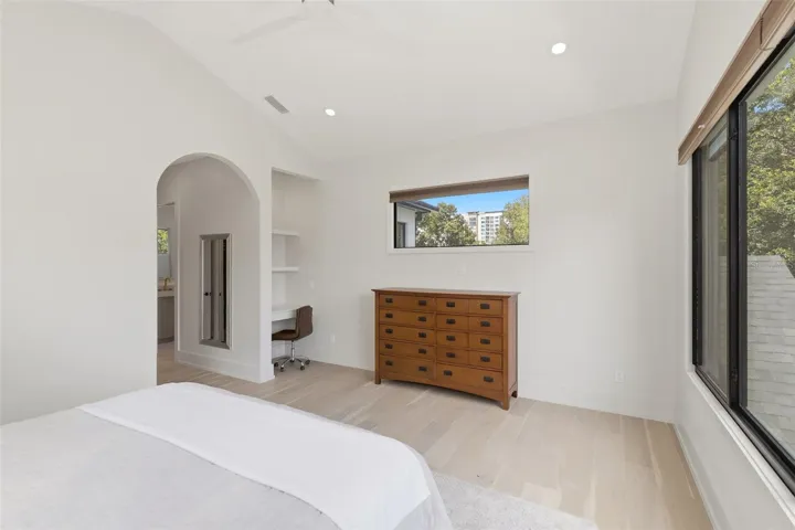 Primary bedroom with vanity/desk area