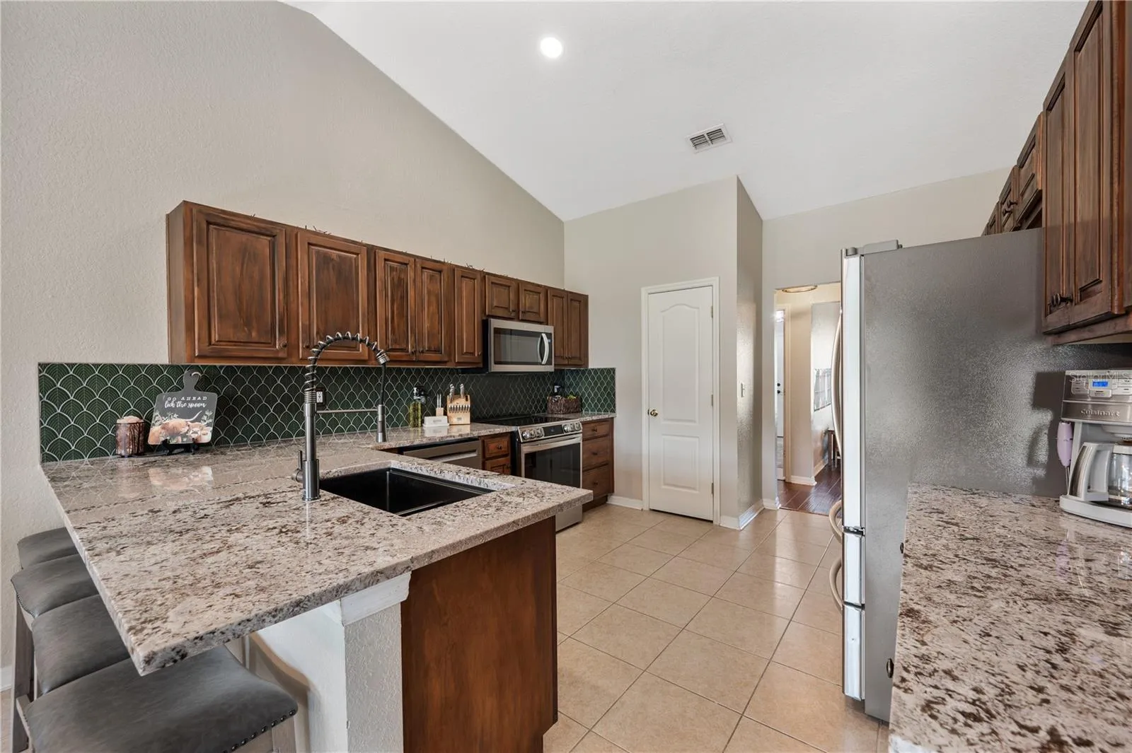 Breakfast bar and view into the kitchen