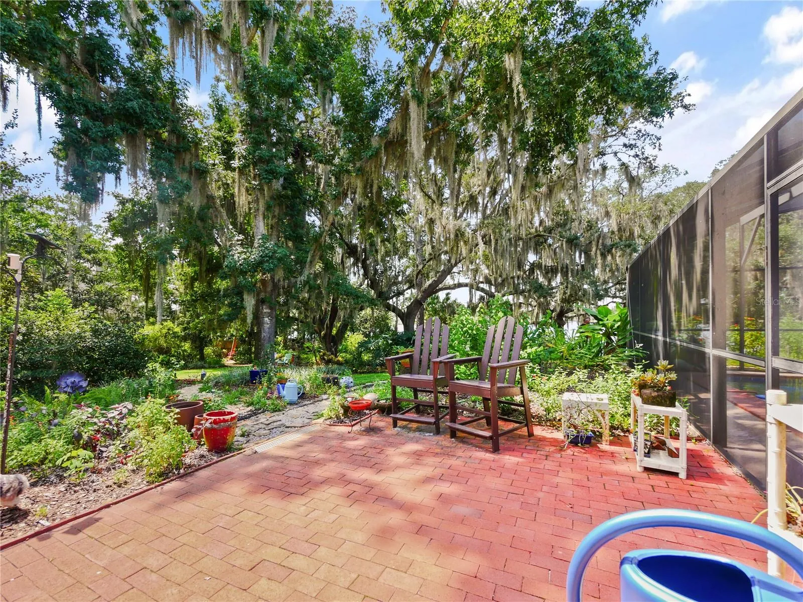 BRICK PATIO OFF POOL