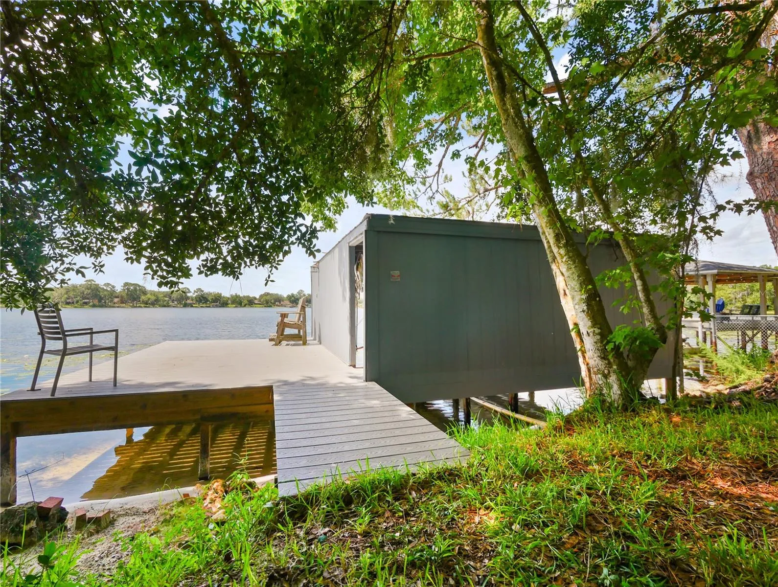SECOND DOCK WITH LARGE DECK AND DOUBLE BOATHOUSE