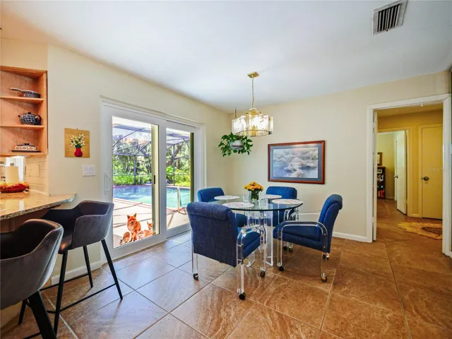 DINETTE / SLIDING DOOR TO POOL