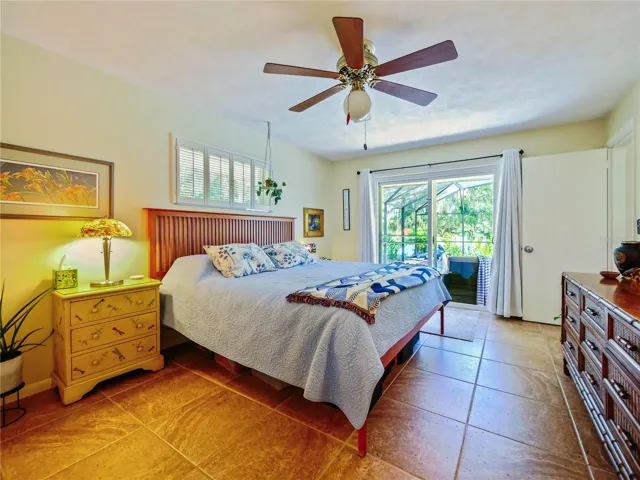 MASTER BEDROOM / SLIDING DOOR TO POOL