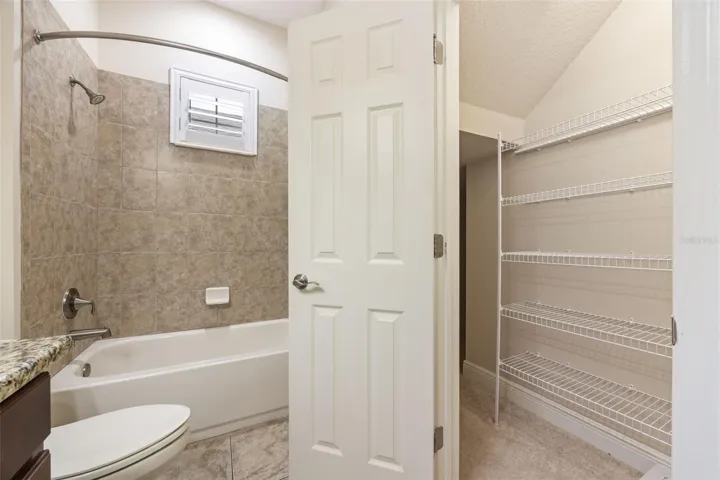 Guest Bathroom Main Floor with Storage under stairs