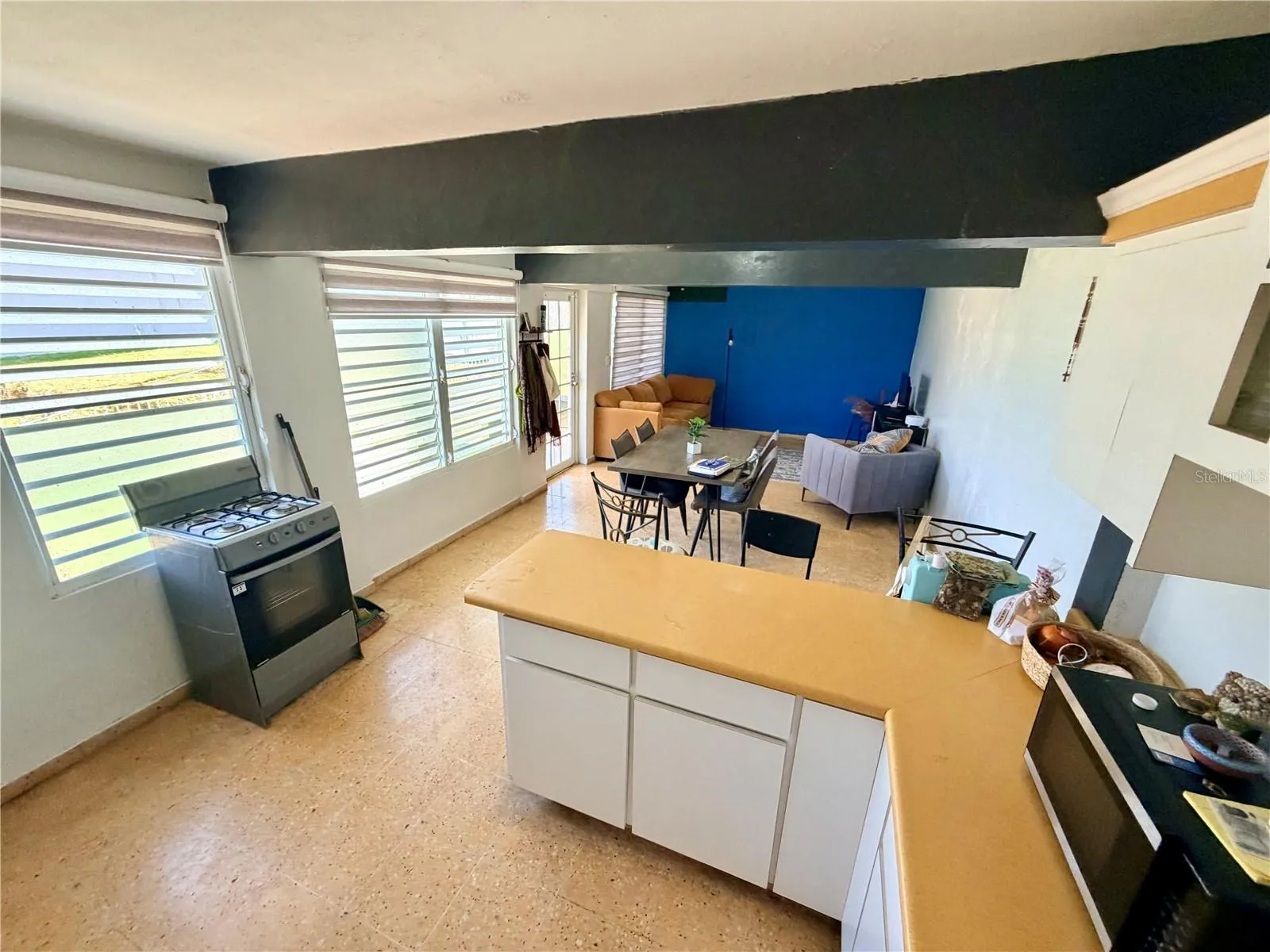 Unit 1 Kicthen, dining area, living room, entryway