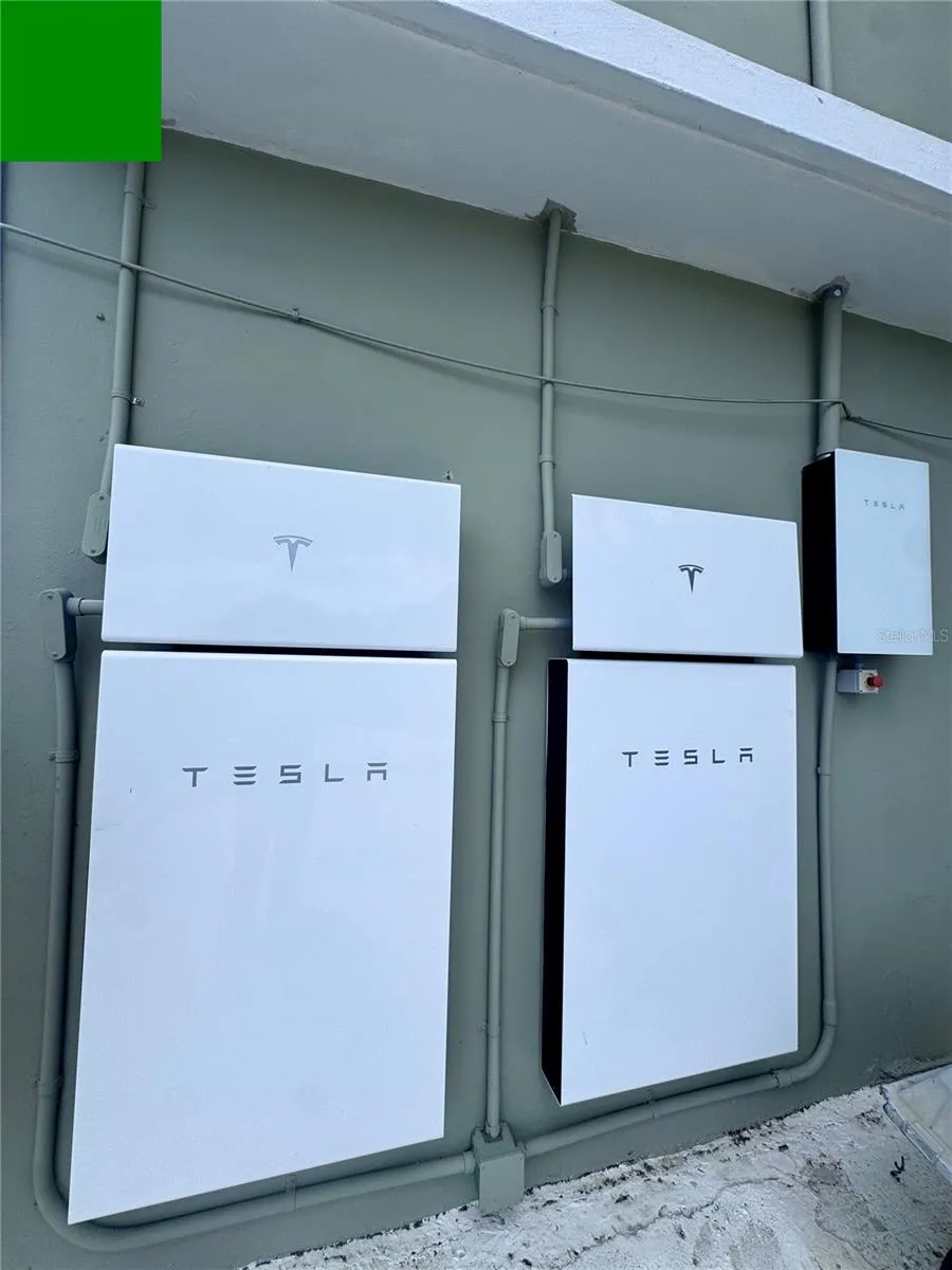 2 Tesla Wallpacks for the 28 solar panals