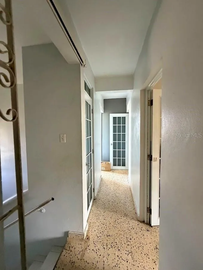 Unit 2 Second floor stairway and hallway to the 3 bedrooms