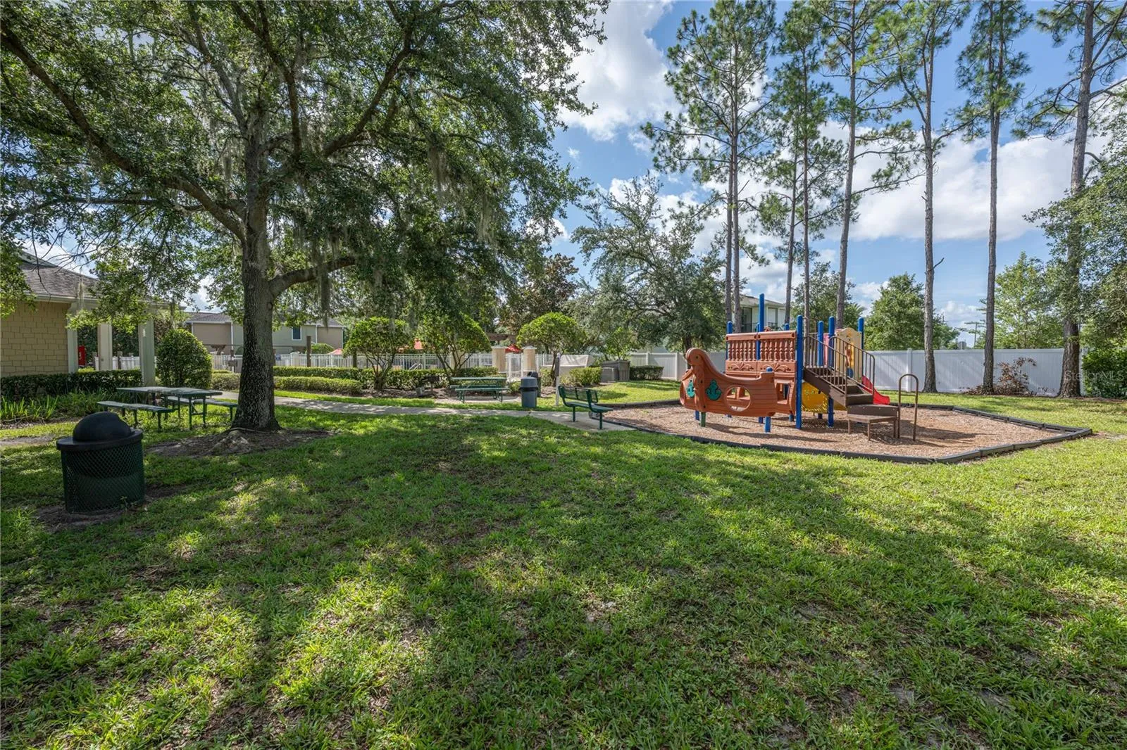 The community playground offers a fun and safe space where children can climb, slide, and play while you enjoy the surrounding green space and shade.