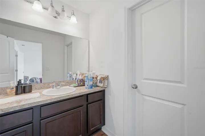 Upstairs full bath #1. Seller in process of packing up. This is a short sale.