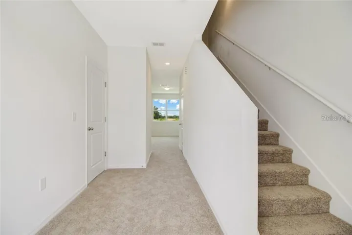 Upstairs you'll find three bedrooms. Living area is downstairs.