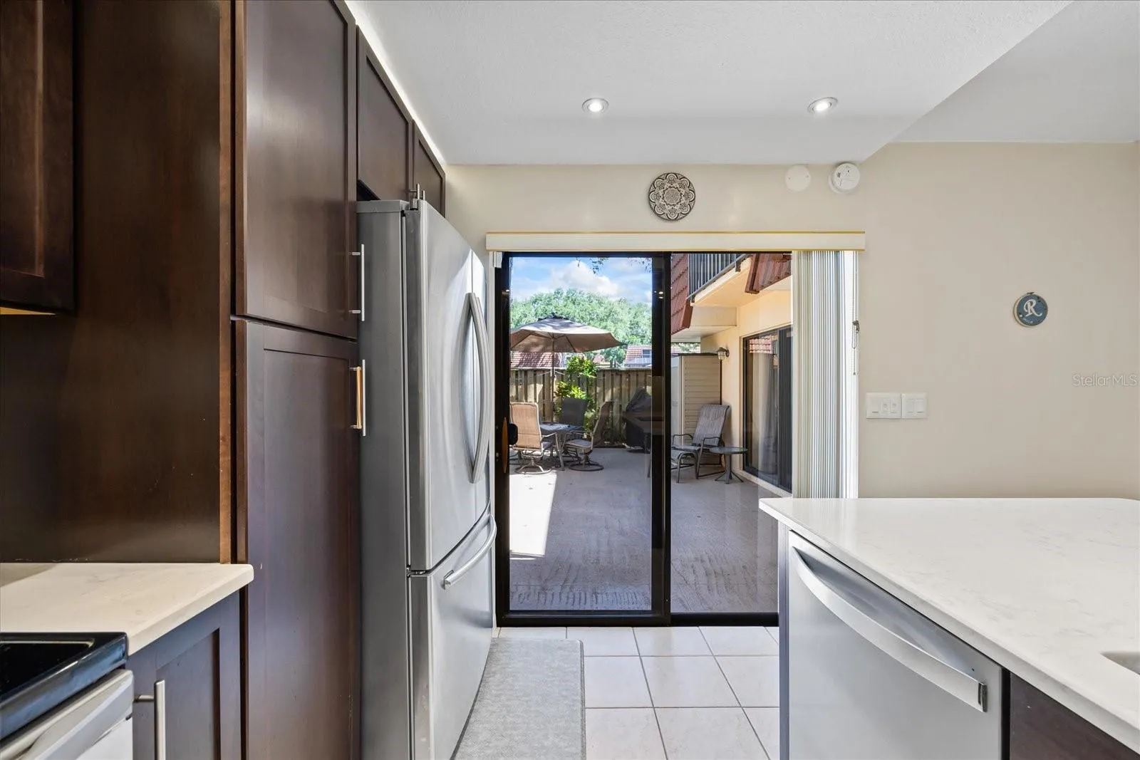 Enjoy outdoor cooking and entertaining? An exceptional layout offers a seamless transition from the kitchen to the private outdoor environs.