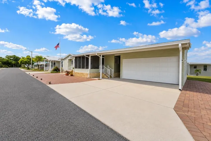 OVERSIZED TWO CAR GARAGE VIEW FROM EXTERIOR