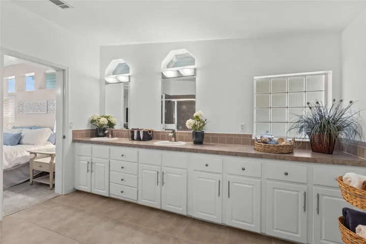PRIMARY BATHROOM OVERSIZED VANITY AND DUAL SINKS