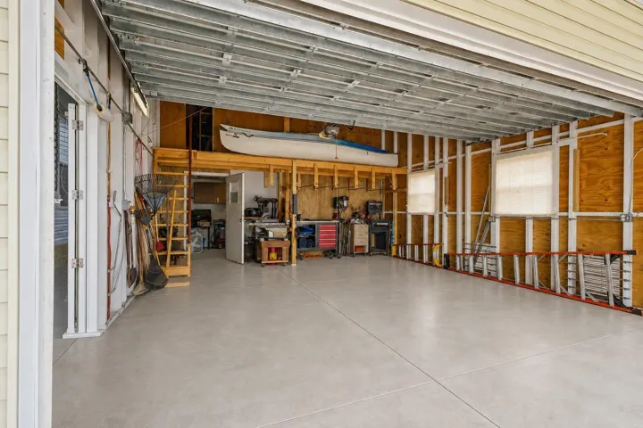 OVERSIZED 2 CAR GARAGE- WORKSHOP-STORAGE ROOMS