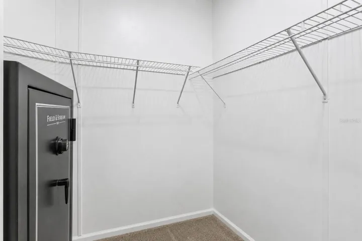 PRIMARY BEDROOM WALK IN CLOSET #2-Safe conveys with home sale.