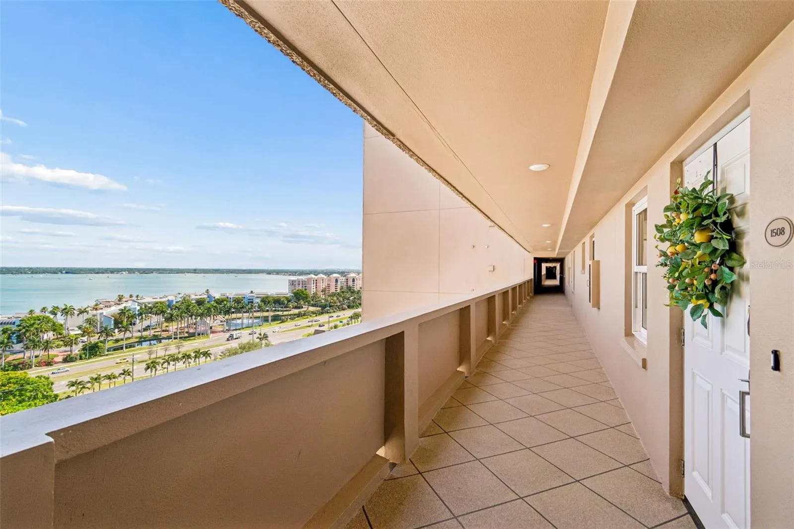 Even your walk to your front door brings peace with open views of Boca Ciega Bay!