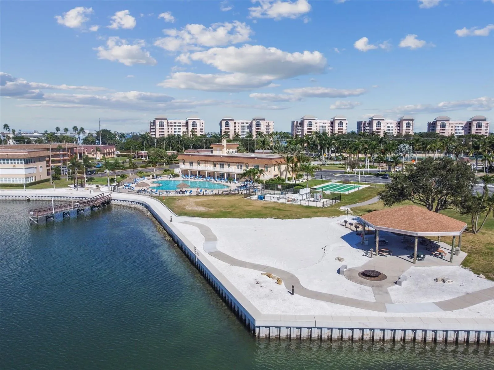 Community Space- Firepit, Grills, Shuffleboard, tennis, pickleball and more!