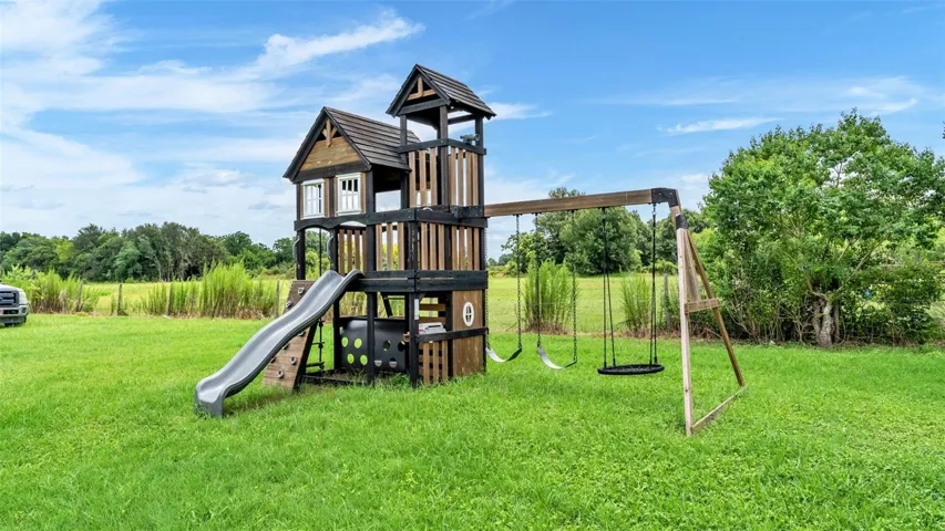 1 full acre of property and playset conveys