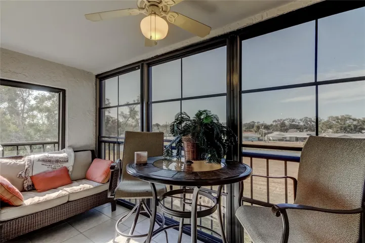 Oversize screened and vinyl window lanai