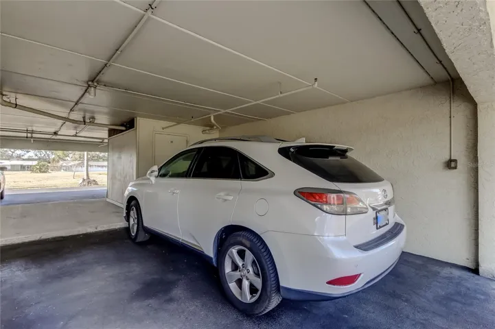 Assigned under building parking and storage closet
