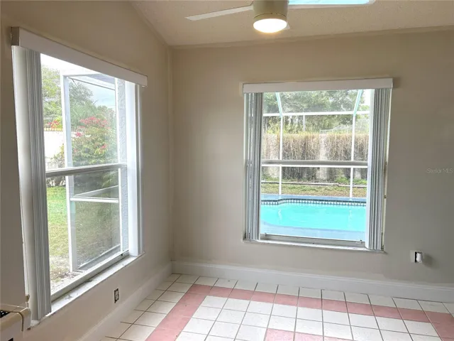 Breakfast nook area view of pool.