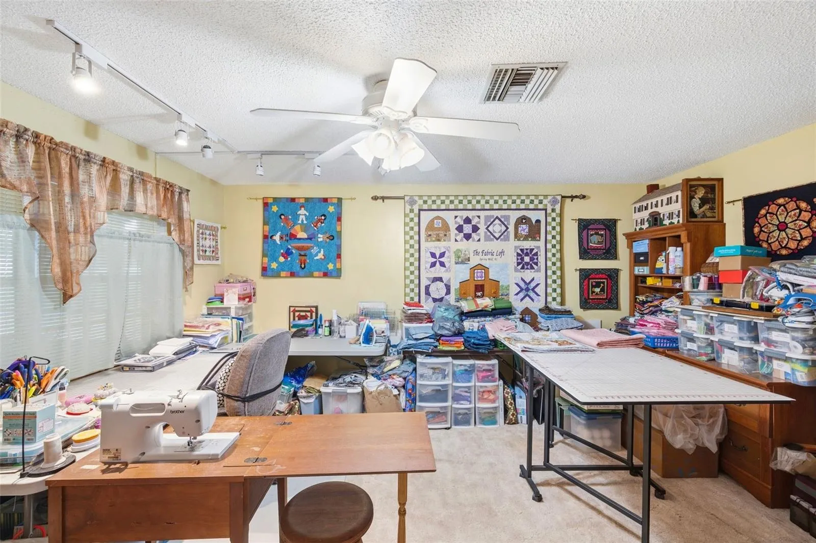 Office/Den used as quilting room.