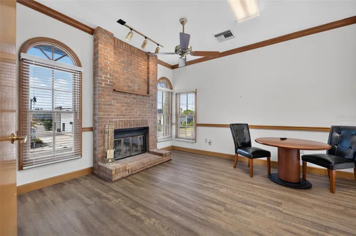 Executive office 2 with fireplace virtually staged