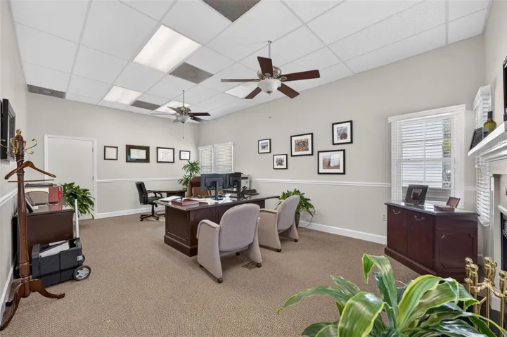 Executive office 1 with fireplace and room for conference area