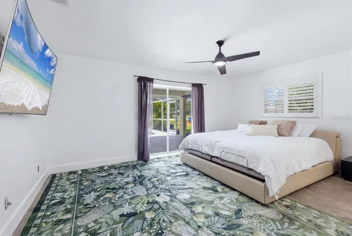 Spacious Primary Bedroom with Pool & Golf Course Views.