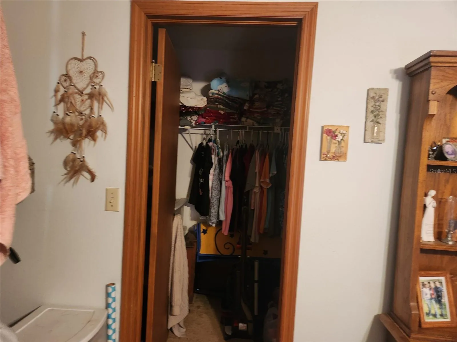 Primary Bedroom walk-in closet