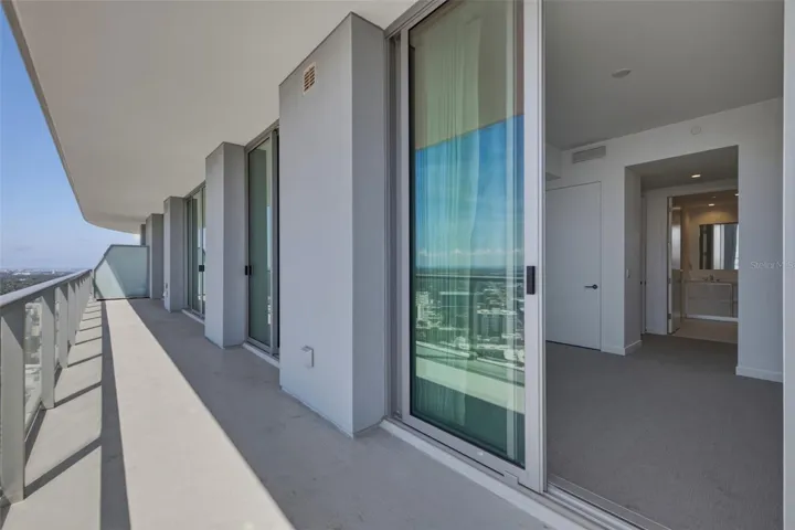 Sliding doors and balcony off each room