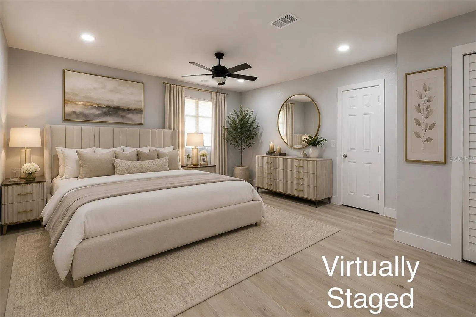 Huge master bedroom with its own private entrance door , an en-suite bathroom, large closet and a door that leads to a kitchenette