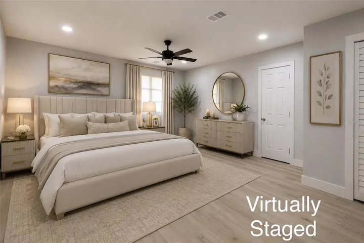Huge master bedroom with its own private entrance door , an en-suite bathroom, large closet and a door that leads to a kitchenette