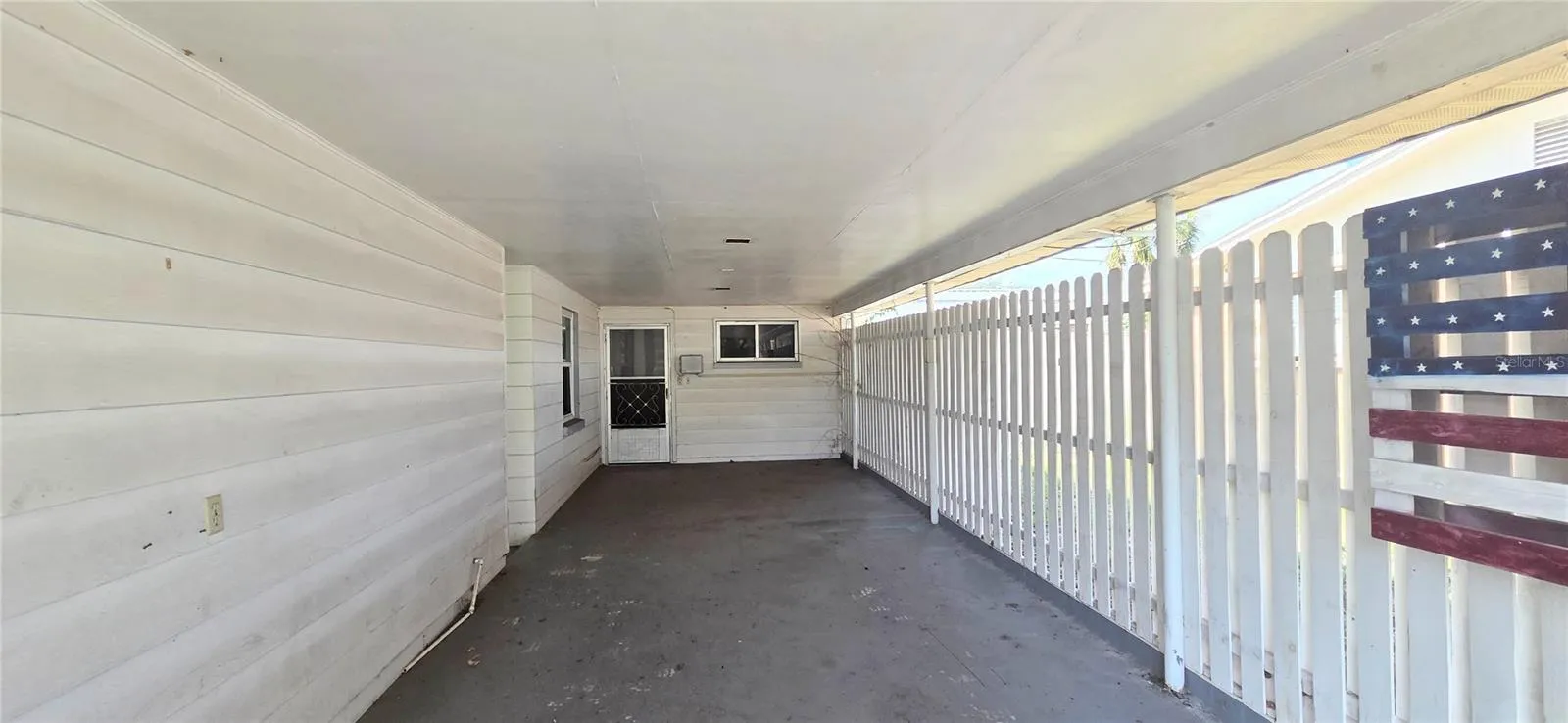 Carport 2 with entrance to Bonus Room