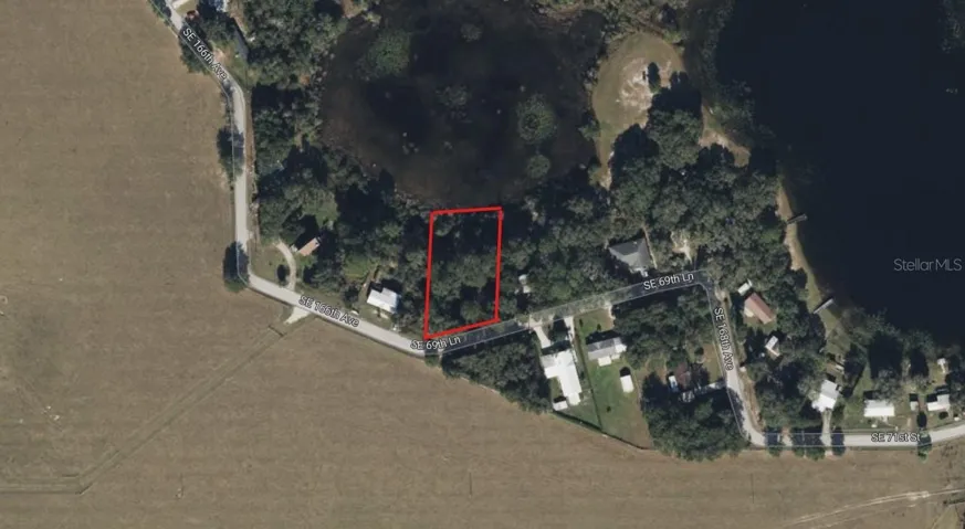 Oversize lot with pond as rear neighbor and large open field in front