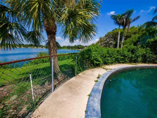Pool deck and pool with the lake beyond