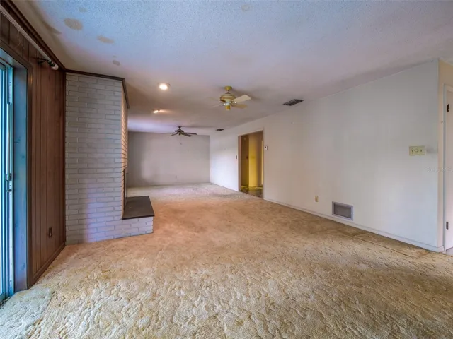 Living room open to the adjacent flex area
