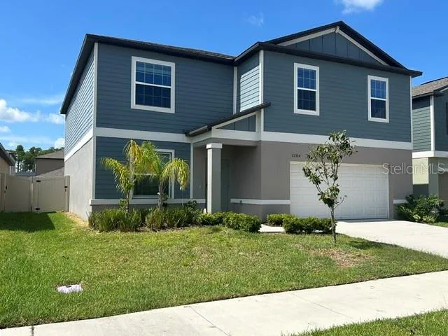 FRONT EXTERIOR w/ PVC PRIVACY FENCE