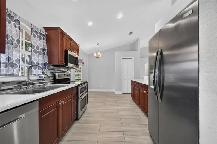 Kitchen view from garage door entry
